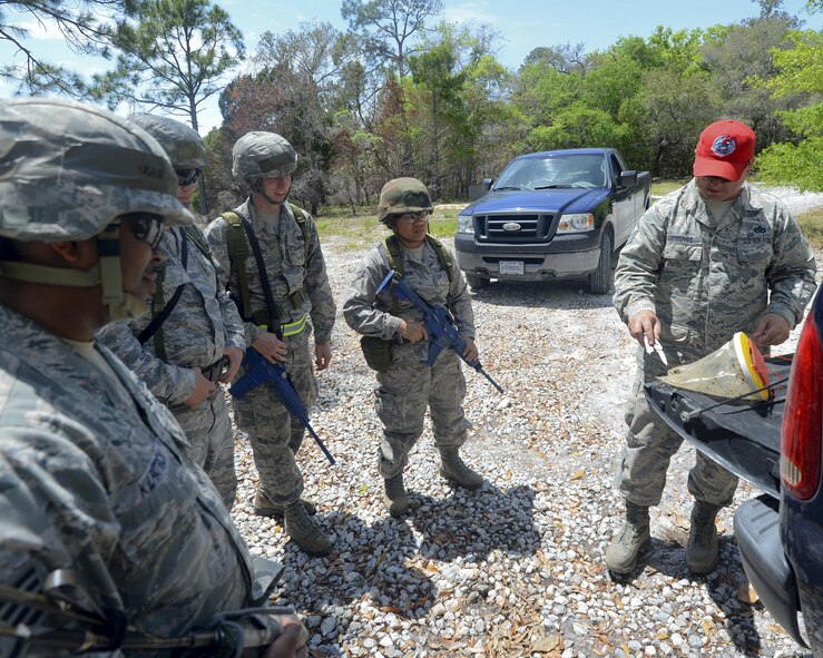 Master Sgt. Jim Cummings, 823rd RED HORSE Detachment 1 pest management instructor, teaches pest management technicians how to properly identify fly larva, April 21. When Airmen are in deployed austere environments, the infrastructure needed to support them is critical to the success of the mission. The instructors at SILVER FLAG train those who make infrastructure more livable for deployed Airmen. This detachment is one of many stationed throughout the Air Force.(U.S. Air Force photo by Airman 1st Class Cody R. Miller/Released)