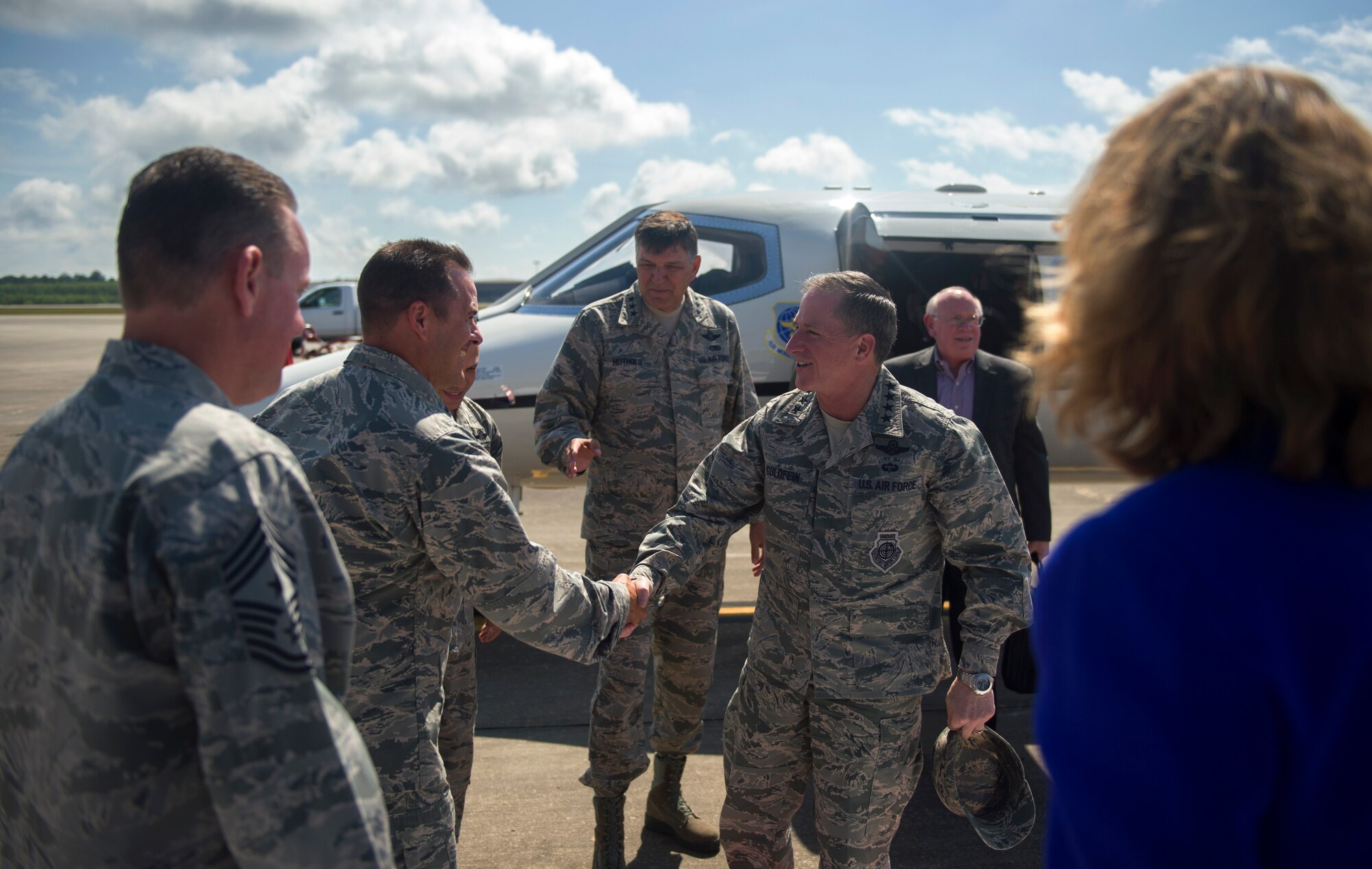 Gen. David L. Goldfein, Air Force vice chief of staff, is greeted by Lt. Gen. Brad Heithold, commander of Air Force Special Operations Command and Col. Sean Farrell, commander of the 1st Special Operations Wing, as he arrives at Hurlburt Field, Fla., April 26, 2016. The general attended the AFSOC Warrior C.A.R.E. summit as a keynote speaker. The summit is designed to give injured and ill service members and caregivers an opportunity to discover available resources, network with helping agencies, develop mentor relationships and expand their life skills. Goldfein was just announced as the president’s nominee to become the next Air Force chief of staff. (U.S. Air Force photo by Airman 1st Class Kai White)