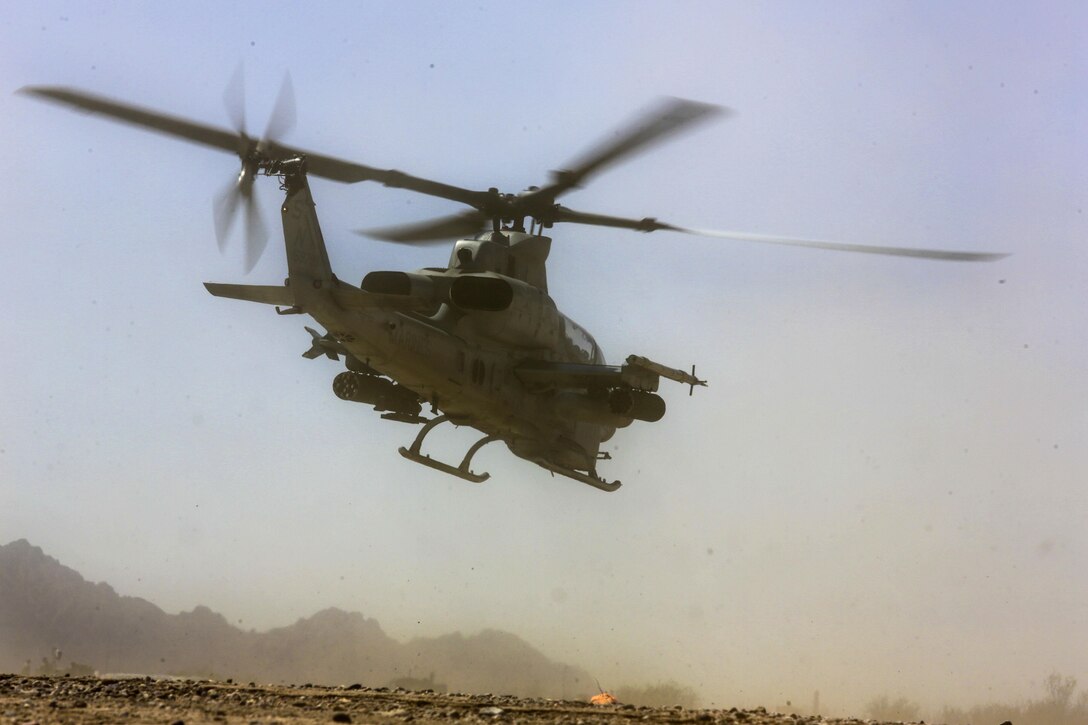 A Marine Corps AH-1Z Viper helicopter departs a forward arming and refueling point during Final Exercise 3, Weapons and Tactics Instructor course 2-16 at Stoval Airfield, near Yuma, Ariz., April 23, 2016. Marine Corps photo by Lance Cpl. Zachary M. Ford