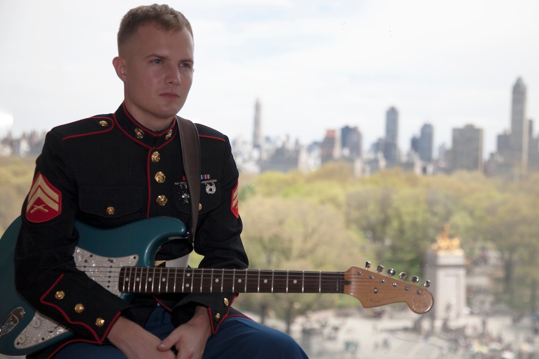 Corporal Mike Borowski poses for a photo at The Jazz at Lincon Center overlooking New York's Central Park, Saturday, April 23, 2016. Borowski, who once lived gig-to-gig looking for work as a musician now travels across the country with the Marine Band San Diego.