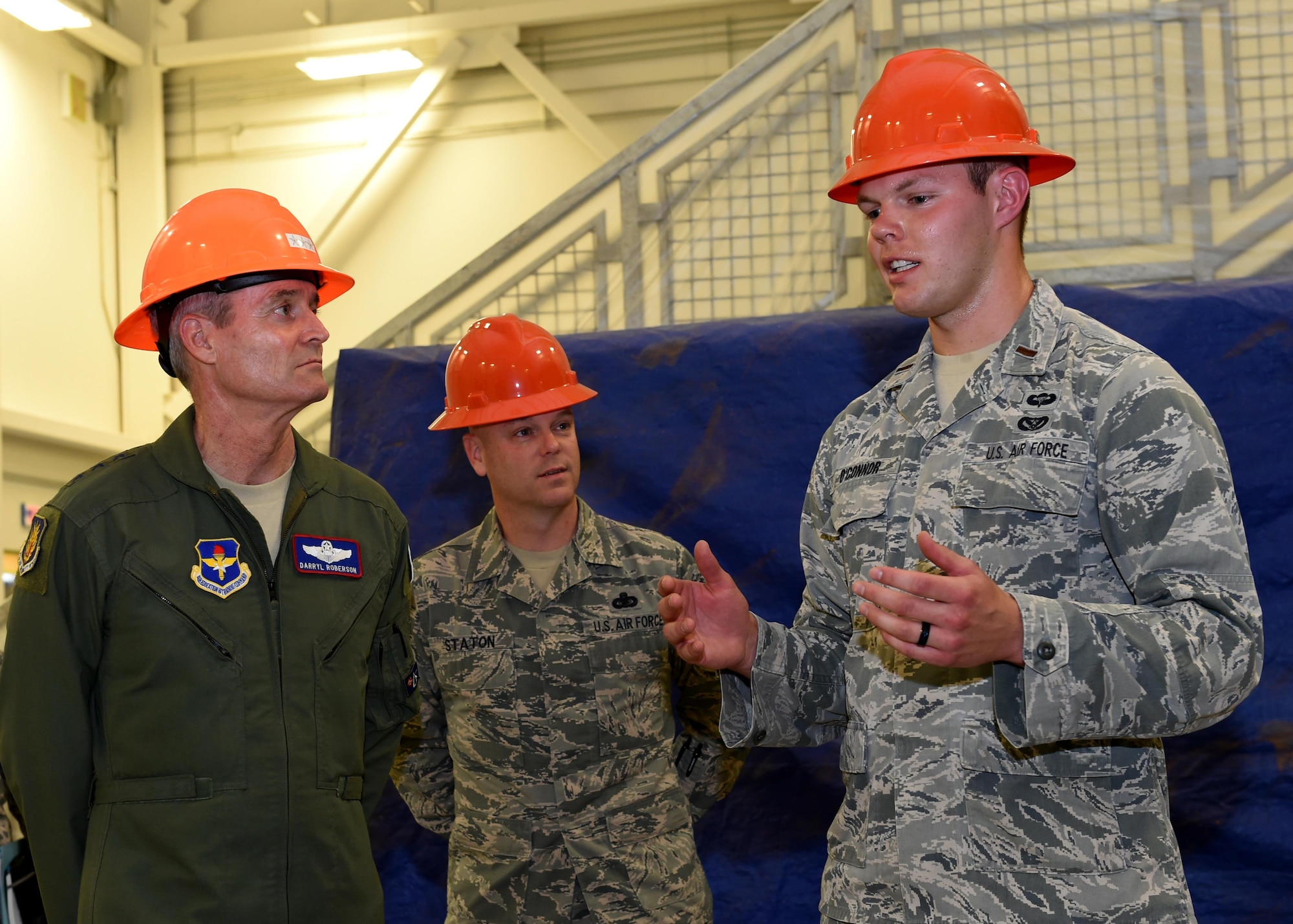 U.S. Air Force 2nd Lt. Jesse O’Connor, 97th Civil Engineer Squadron KC-46 program manager, gives U.S. Air Force Lt. Gen. Darryl Roberson, commander of Air Education Training Command and Chief Master Sgt. David Staton, AETC command chief, a tour of the future KC-46 Pegasus squadron building, April 25, 2016, at Altus Air Force Base, Okla. Roberson visited Altus AFB to gain a better understanding of the base’s training mission and discuss Air Force topics, including the U.S. Air Force KC-46 Pegasus, the importance of AETC missions and the need for innovation in the U.S. Air Force.  (U.S. Air Force photo by Airman 1st Class Kirby Turbak/Released)