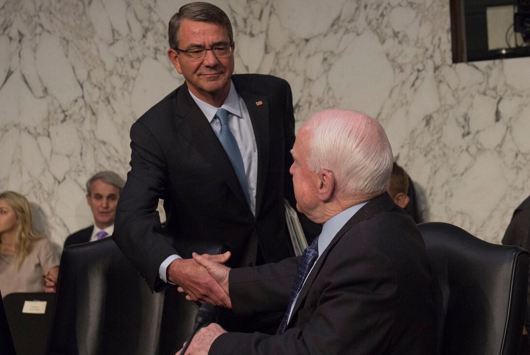 Defense Secretary Ash Carter exchanges greetings with Sen. John McCain, chairman of the Senate Armed Services Committee, after arriving to testify before the committee on counter-Islamic State of Iraq and the Levant operations and Middle East strategy in Washington, D.C., April 28, 2016. DoD photo by Air Force Master Sgt. Adrian Cadiz