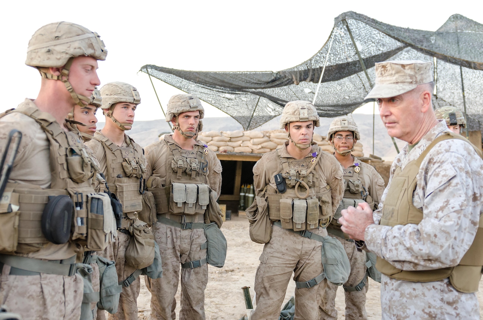 Chairman of the Joint Chiefs of Staff Gen. Joseph Dunford visits with U.S. Marines of the 26th Marine Expeditionary Unit at Kara Soar Base, Makhmur, Iraq, April 22, 2016, after presenting four Marines with the Purple Heart. (U.S. Army Photo by Staff Sgt. Peter J. Berardi)