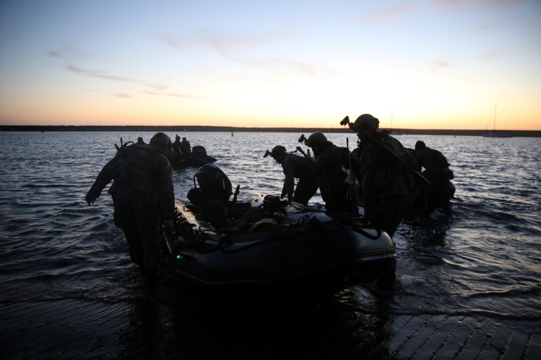 Marines with Company A, 1st Reconnaissance Battalion, 1st Marine Division, carry a Combat Rubber Raiding Craft into the water in order to conduct beach searches during an amphibious operations training exercise, as part of an Expeditionary Operations Training Group course at Camp Pendleton April 21, 2016. Recon Marines specialize in providing in-depth reconnaissance on a designated area. This exercise was conducted in preparation for the 11th Marine Expeditionary Unit’s deployment in the near future. (U.S. Marine Corps Photo by Cpl. Demetrius Morgan/RELEASED)