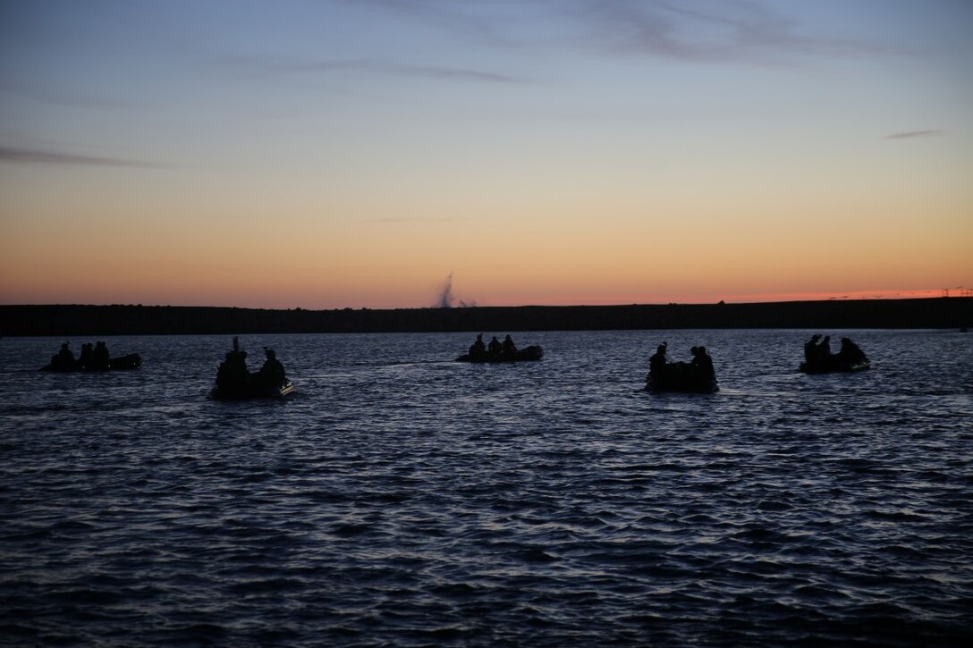 Marines with Company A, 1st Reconnaissance Battalion, 1st Marine Division, advance to their objective during an amphibious operations training exercise as part of an Expeditionary Operations Training Group course at Camp Pendleton April 21, 2016. The Marines conducted beach surveys from designated positions in the ocean, where they observed and reported information to their headquarters team. (U.S. Marine Corps Photo by Cpl. Demetrius Morgan/RELEASED)