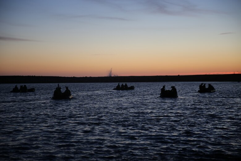 Marines with Company A, 1st Reconnaissance Battalion, 1st Marine Division, advance to their objective during an amphibious operations training exercise as part of an Expeditionary Operations Training Group course at Camp Pendleton April 21, 2016. The Marines conducted beach surveys from designated positions in the ocean, where they observed and reported information to their headquarters team. (U.S. Marine Corps Photo by Cpl. Demetrius Morgan/RELEASED)
