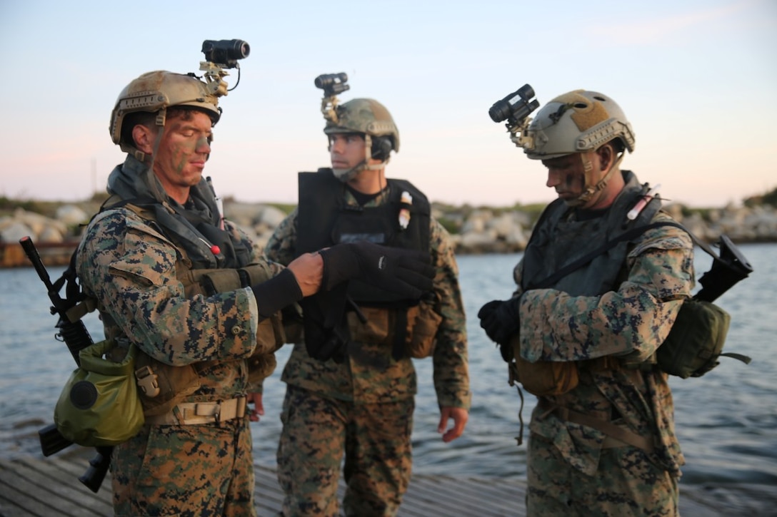 Marines with Company A, 1st Reconnaissance Battalion, 1st Marine Division, check their gear before conducting an amphibious operations training exercise during an Expeditionary Operations Training Group course at Camp Pendleton April 21, 2016. Before executing their mission, Recon Marines tested their Combat Rubber Raiding Craft’s top speeds and made sure their gear was secured in preparation for the 11th Marine Expeditionary Unit’s deployment in the near future. (U.S. Marine Corps Photo by Cpl. Demetrius Morgan/RELEASED)