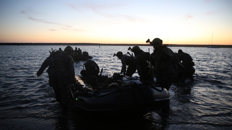 Marines with Company A, 1st Reconnaissance Battalion, 1st Marine Division, carry a Combat Rubber Raiding Craft into the water in order to conduct beach searches during an amphibious operations training exercise, as part of an Expeditionary Operations Training Group course at Marine Corps Base Camp Pendleton, California, April 21, 2016. Recon Marines specialize in providing in-depth reconnaissance on a designated area. This exercise was conducted in preparation for the 11th Marine Expeditionary Unit’s deployment in the near future.