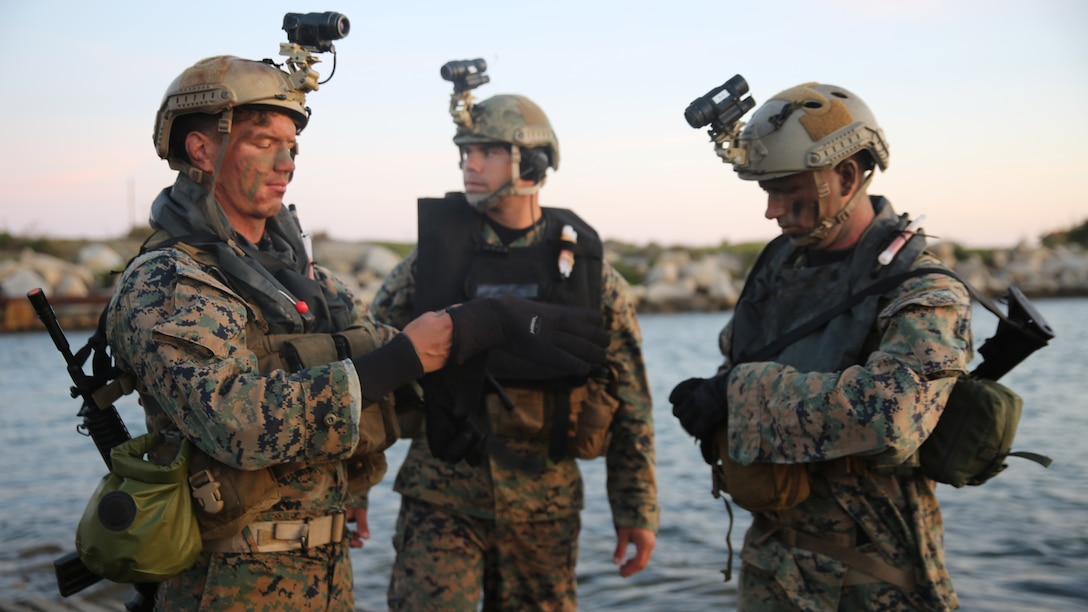 Marines with Company A, 1st Reconnaissance Battalion, 1st Marine Division, check their gear before conducting an amphibious operations training exercise during an Expeditionary Operations Training Group course at Marine Corps Base Camp Pendleton, California, April 21, 2016. Before executing their mission, Recon Marines tested their Combat Rubber Raiding Craft’s top speeds and made sure their gear was secured in preparation for the 11th Marine Expeditionary Unit’s deployment in the near future.