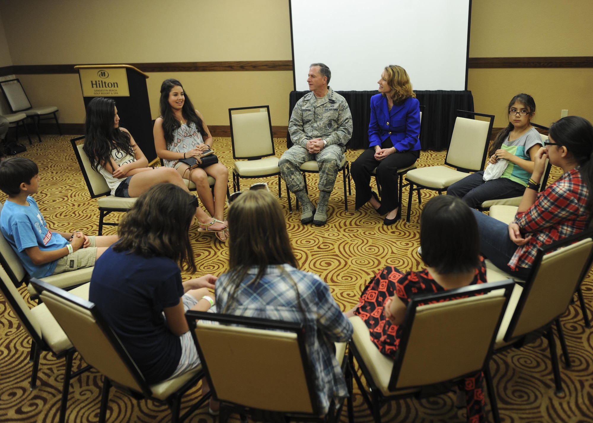 Gen. David Goldfein, Air Force vice chief of staff, and Lisa Disbrow, undersecretary of the Air Force, speak to the children of wounded, injured and ill members during the AFSOC Warrior C.A.R.E. Summit at the Hilton Sandestin Beach Golf Resort & Spa April 26, 2016. During the summit, Goldfein and Disbrow announced their plan for an Airman for life program, which will take care of wounded, injured and ill members after they leave the service. (U.S. Air Force photo by Senior Airman Meagan Schutter) 
