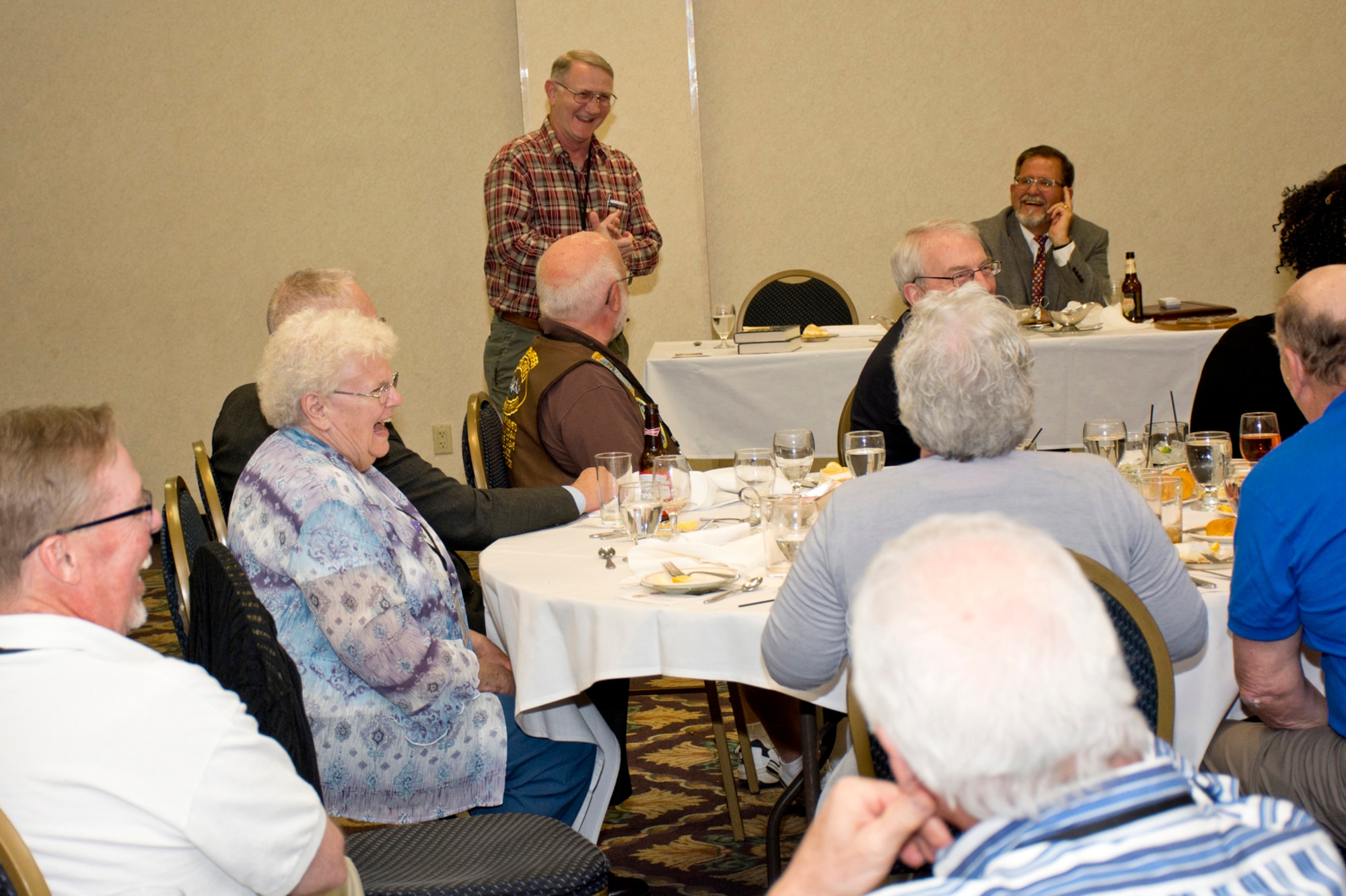 Former U.S. Navy Torpedoman’s Mate 2nd Class (SS) Jeff Walston, entertains with a sea story during dinner at the All Cavalla Reunion 2016, in Galveston, Texas, Apr. 23, 2016. The bi-annual reunion is an opportunity for former crewmembers of the USS Cavalla SS - SSK - AGSS - 244 and USS Cavalla (SSN 684) to reconnect with each other, make new friends, share sea stories and honor the memory of those submariners who have passed. Walston, who is now a Master Sergeant in the U.S. Air Force Reserve, is assigned to the 913th Airlift Group, at Little Rock Air Force Base, Ark., and served on the USS Cavalla (SSN 684) from 1977 to 1979. He joined the Air Force Reserve in 2001. (Courtesy photo by Eva Walston)