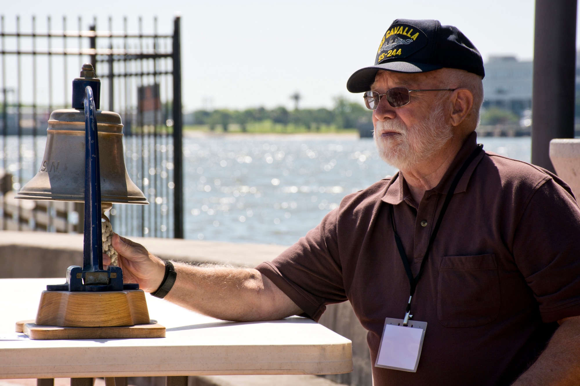 Retired U.S. Navy Lt. John Beckett, rings the bell in honor of the 52 submarines lost during World War II during the “All Cavalla Reunion Memorial Service” at Seawolf Park in Galveston, Texas, Apr. 23, 2016. The bi-annual reunion is an opportunity for former crewmembers of the USS Cavalla SS - SSK - AGSS – 244 and USS Cavalla (SSN 684) to reconnect with each other, make new friends, share sea stories and honor the memory of those submariners who have passed. U.S. Air Force Reserve Master Sgt. Jeff Walston, a public affairs technician assigned to the 913th Airlift Group at Little Rock Air Force Base, Ark., served on the USS Cavalla (SSN 684) from 1977 to 1979, when he was in the U.S. Navy. (Courtesy photo by Jeff Walston)