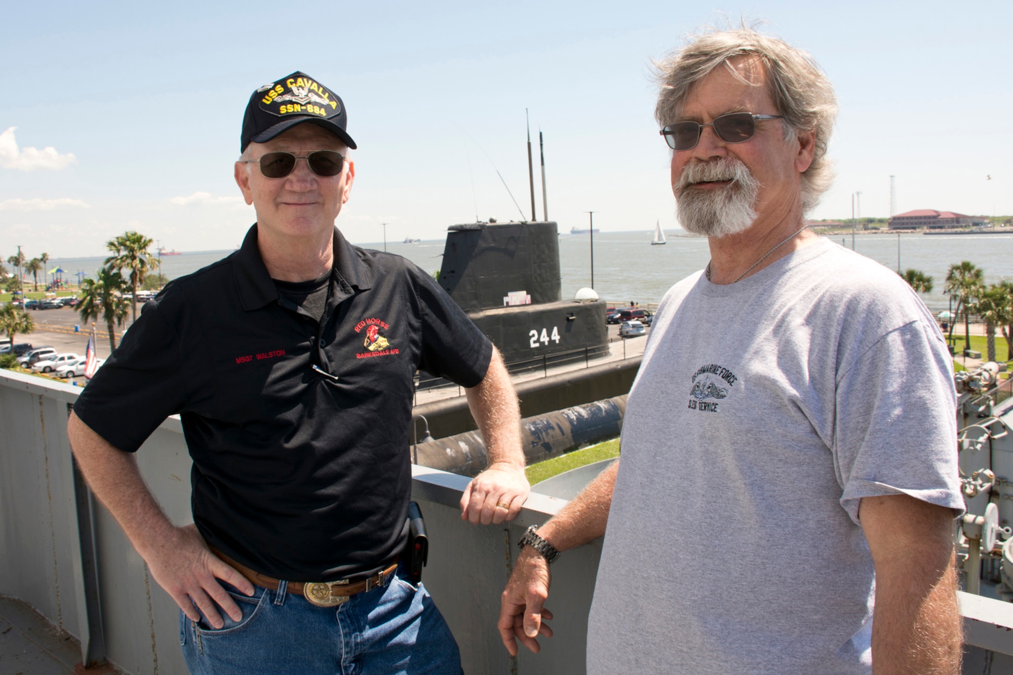 Former U.S. Navy Torpedoman’s Mates Jeff Walston and Sam Chapman, pose for a photo aboard the USS Stewart (DE 238) at Seawolf Park in Galveston, Texas, Apr. 23, 2016. They are attending the All Cavalla Reunion 2016 in Galveston. The bi-annual reunion is an opportunity for former crewmembers of the USS Cavalla SS - SSK - AGSS - 244 and USS Cavalla (SSN 684) to reconnect with each other, make new friends, share sea stories and honor the memory of those submariners who have passed. Walston, who is now a Master Sergeant in the U.S. Air Force Reserve, assigned to the 913th Airlift Group, at Little Rock Air Force Base, Ark., served on the Cavalla (SSN 684) from 1977 to 1979, and left the Navy as a 2nd Class Petty Officer before joining the Air Force Reserve. (Courtesy photo by Eva Walston)