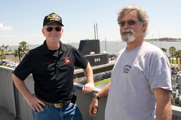 Former U.S. Navy Torpedoman’s Mates Jeff Walston and Sam Chapman, pose for a photo aboard the USS Stewart (DE 238) at Seawolf Park in Galveston, Texas, Apr. 23, 2016. They are attending the All Cavalla Reunion 2016 in Galveston. The bi-annual reunion is an opportunity for former crewmembers of the USS Cavalla SS - SSK - AGSS - 244 and USS Cavalla (SSN 684) to reconnect with each other, make new friends, share sea stories and honor the memory of those submariners who have passed. Walston, who is now a Master Sergeant in the U.S. Air Force Reserve, assigned to the 913th Airlift Group, at Little Rock Air Force Base, Ark., served on the Cavalla (SSN 684) from 1977 to 1979, and left the Navy as a 2nd Class Petty Officer before joining the Air Force Reserve. (Courtesy photo by Eva Walston)