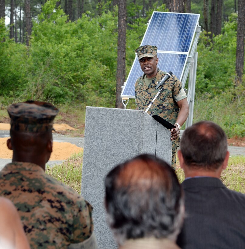 Col. James C. Carroll III, commanding officer, Marine Corps Logistics Base Albany, addresses attendees during a large-scale solar facility ground breaking ceremony held aboard the installation, April 28.
