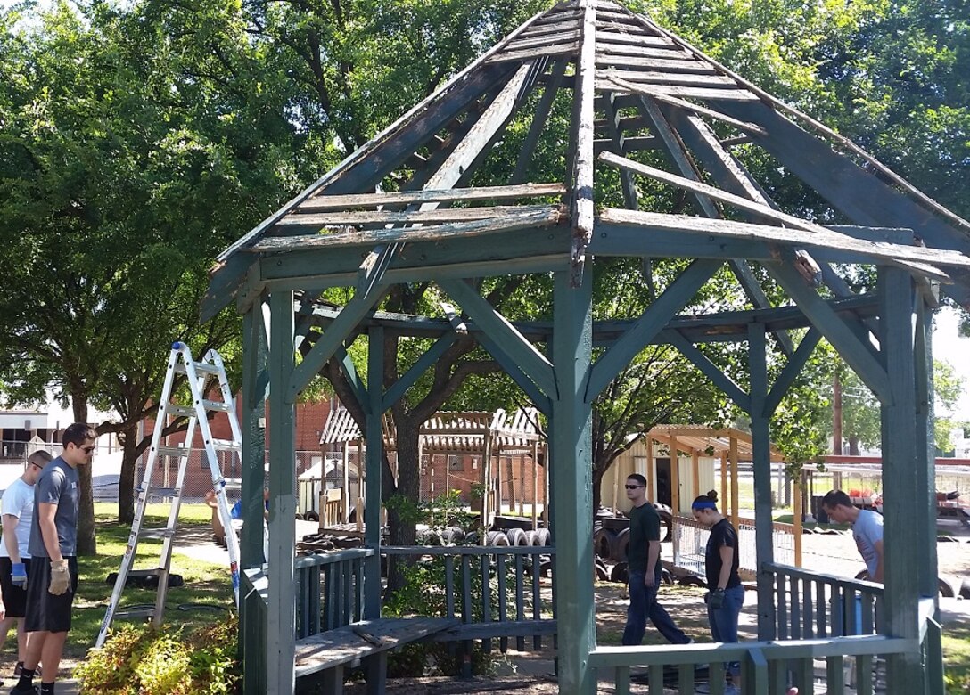 Volunteers from the 80th Flying Training Wing at Sheppard Air Force Base lent a helping hand to an area daycare April 23, 2016 in Wichita Falls, Texas. As undergraduate pilots progress through the 55-week Euro-NATO Joint Jet Pilot Training Program, they make a concerted effort to become involved in the local community. ENJJPT Class 17-02, led by 1st Lt. Matthew Morse, took on the dismantling and clean-up of a playground gazebo as a community project. The structure had become a safety concern and financial burden to the center. In less than two hours, the 15 volunteers, from the T-6 H and C flights, removed the gazebo and saved the center an estimated $5,000. 
