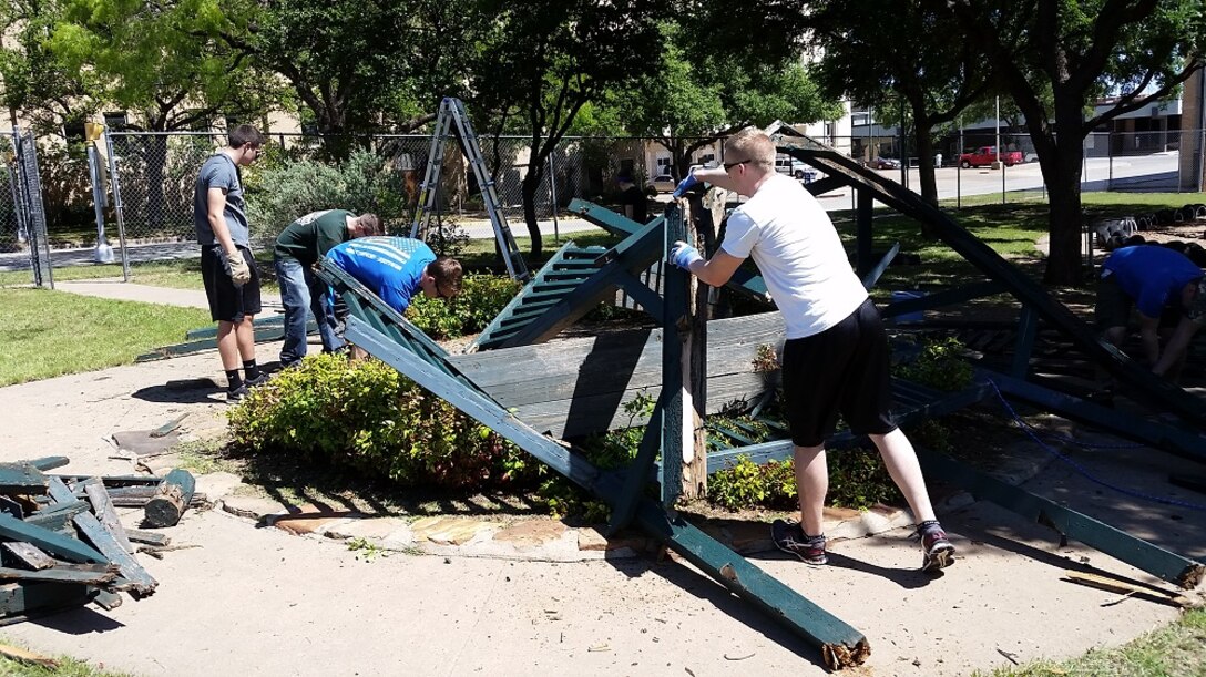 Volunteers from the 80th Flying Training Wing at Sheppard Air Force Base lent a helping hand to an area daycare April 23, 2016 in Wichita Falls, Texas. As undergraduate pilots progress through the 55-week Euro-NATO Joint Jet Pilot Training Program, they make a concerted effort to become involved in the local community. ENJJPT Class 17-02, led by 1st Lt. Matthew Morse, took on the dismantling and clean-up of a playground gazebo as a community project. The structure had become a safety concern and financial burden to the center. In less than two hours, the 15 volunteers, from the T-6 H and C flights, removed the gazebo and saved the center an estimated $5,000. (U.S. Air Force Photo)