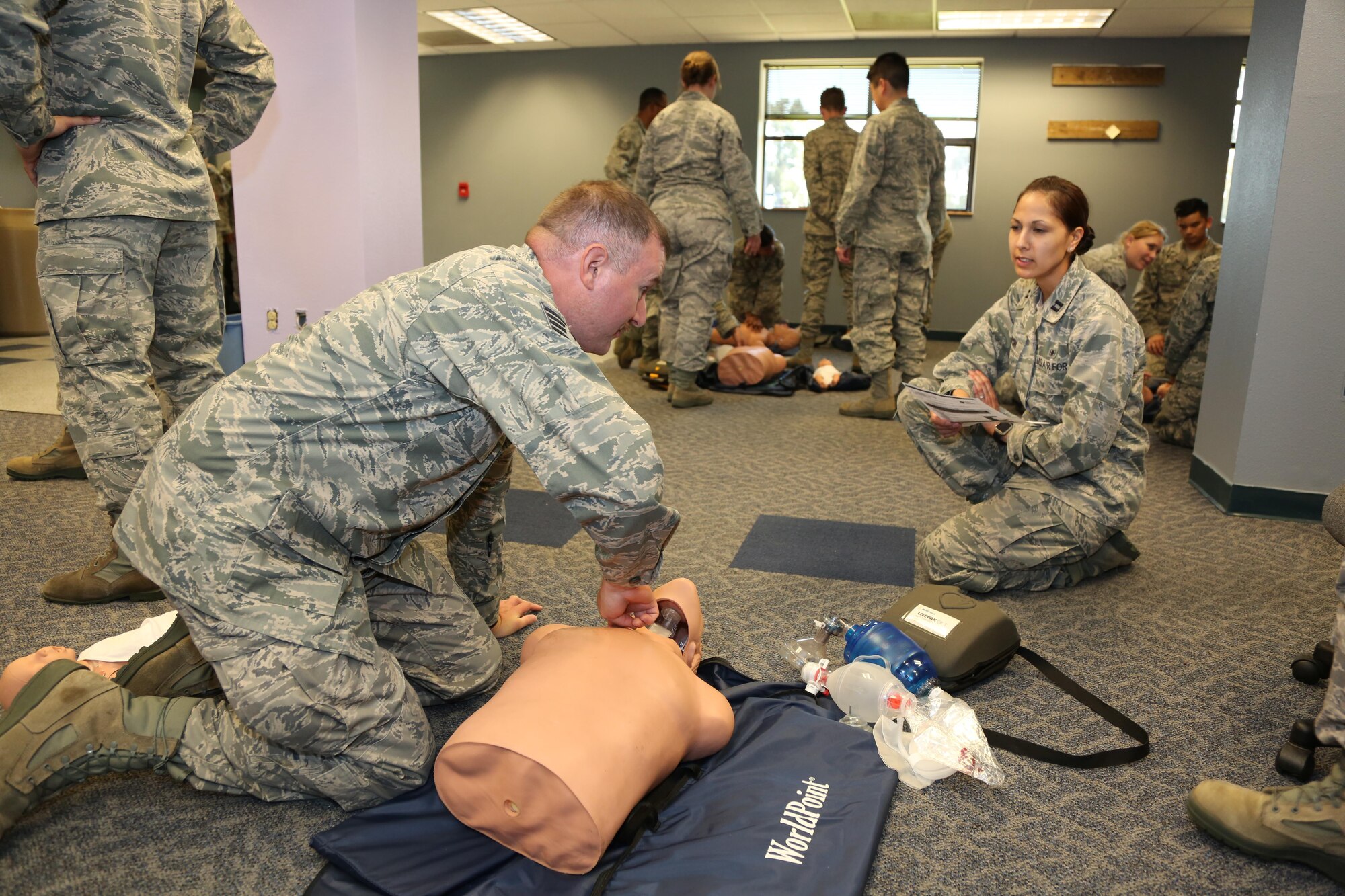 Citizen Airmen from the 349th Air Mobility Wing take part in emergency medical technician training in the 349th Medical Squadron’s new training room, April 17, 2016 at Travis Air Force Base, Calif.  The repurposed office space will improve the squadron’s ability to conduct a wide range of skill and qualification training.  (U.S. Air Force photo/Lt. Col. Robert Couse-Baker/ Released)
