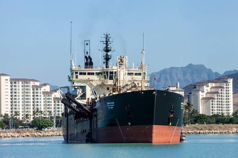 The U.S. Army Corps of Engineers’ hopper dredge Essayons just finished vital maintenance dredging of the federal navigation channels in Honolulu, Barbers Point (shown here), Kahului, Hilo, and Nawiliwili commercial harbors.  Hawaii is a maritime state over 2,400 miles from the mainland and far more dependent on its harbors than most of the United States. The Hawaii state DOT claims that over 80 percent of all consumer goods – food, clothing, autos, building supplies, machinery, paper, and allied products, medical supplies, and agricultural materials – are imported into the state. Of that 80 percent, approximately 98 percent enters Hawaii though commercial harbors on the major islands.  To ensure that these vital goods continue to arrive in Hawaii, the Essayons dredged approximately 300,000 cubic yards from the harbors and safely disposed of it at EPA-designated ocean disposal sites.  Special care was taken to protect marine life such as sea turtles.