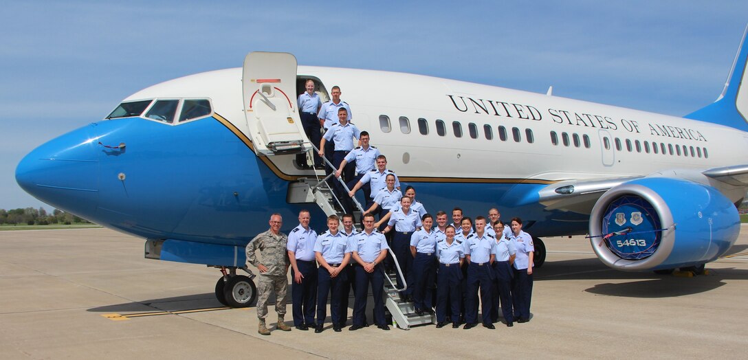 (Left) Maj. Stan Paregien, 932nd Airlift Wing community relations escort, shows the incredible C-40C aircraft to college ROTC (Reserve Officer Training Corps) cadets from the University of Iowa, during a recent special event held at the 932nd Operations Group.  The cadets were impressed by the distinguished visitor mission, the pilots, flight attendants, and the maintainers who keep the aircraft ready to go at all times.  (Photo submitted)