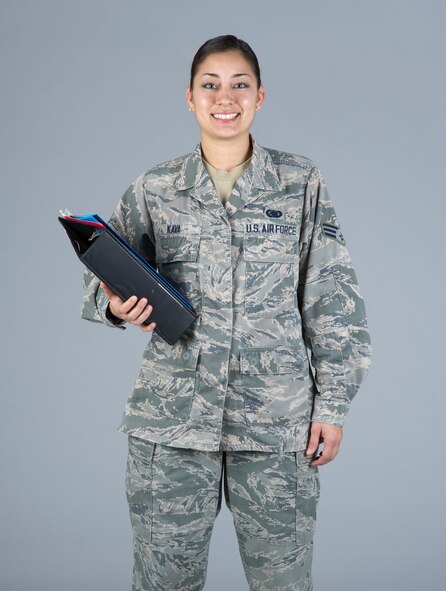 Senior Airman Cinnamon Kava, 60th Logistics Readiness Squadron decentralized supply support, poses for a photo in December 2014 at Travis Air Force Base, Calif. 