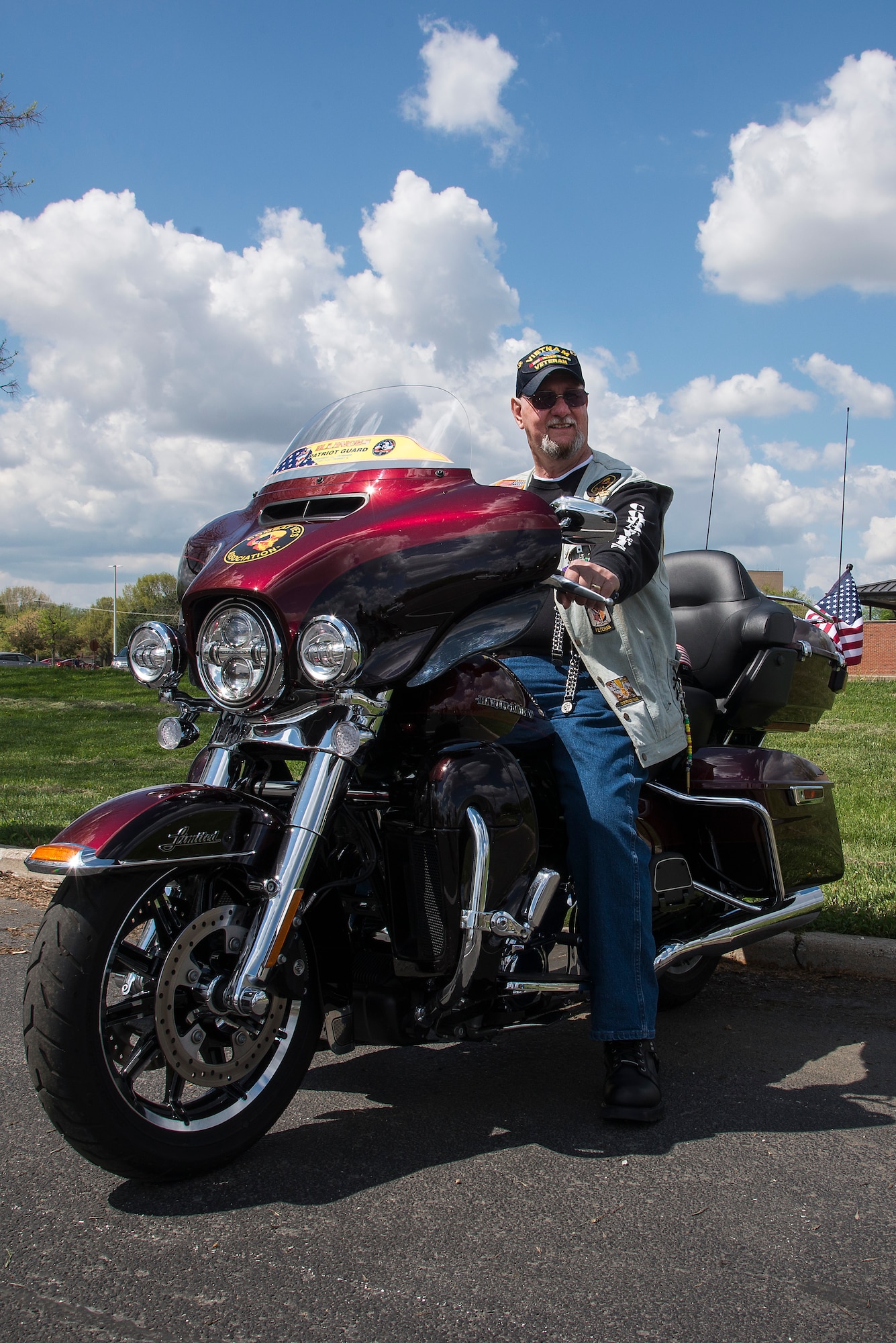 Retired Army SGT. Cecil Wade sits on his motorcycle April 22, 2016, at Scott Air Force Base, Illinois. Wade is now involved with the Patriot Guard. He is also a life member of the Veterans of Foreign Wars and the Disabled American Veterans.  (Air Force photo by Airman Gwendalyn Smith)