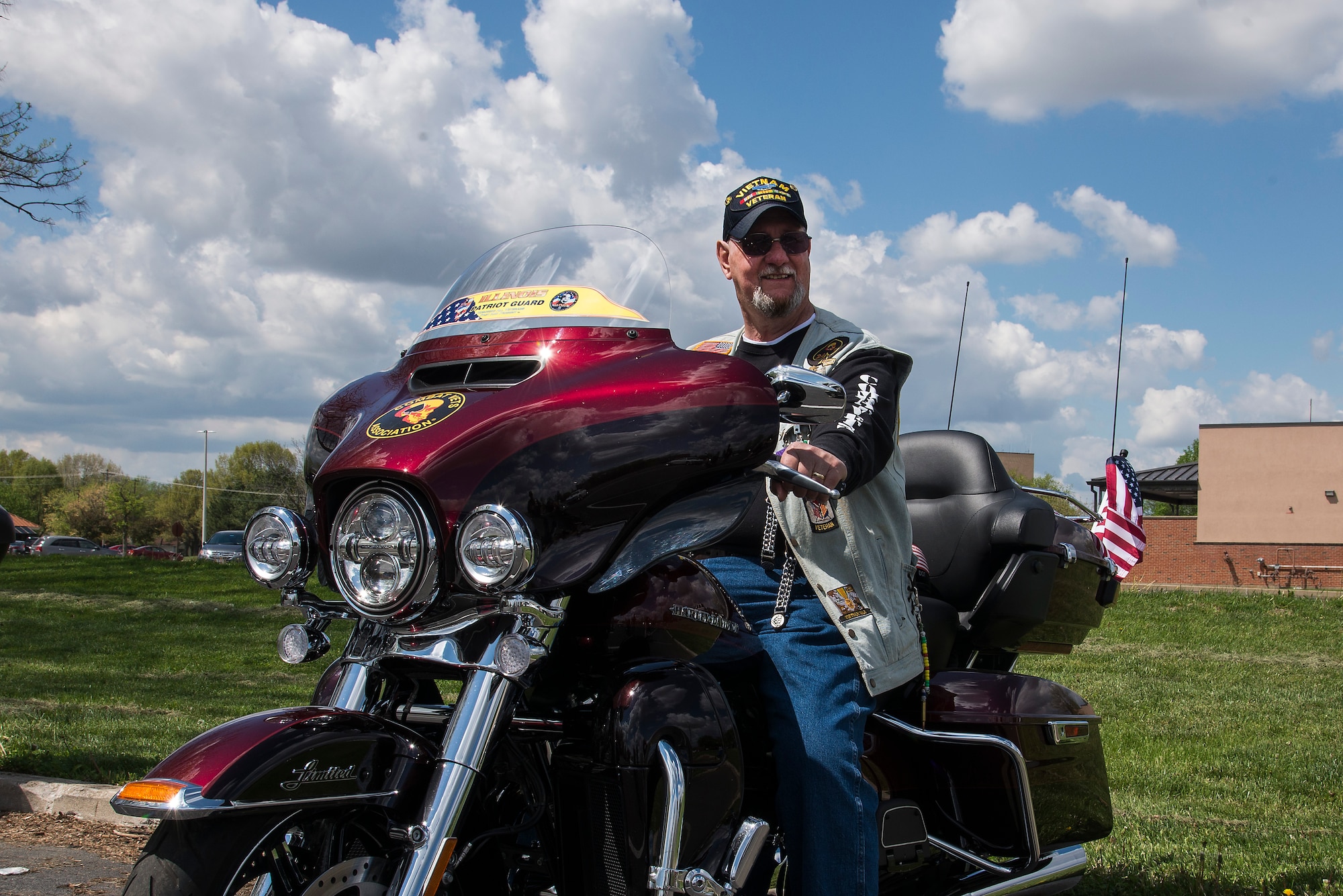 Retired Army SGT. Cecil Wade sits on his motorcycle April 22, 2016, at Scott Air Force Base, Illinois. Wade is now involved with the Patriot Guard. He is also a life member of the Veterans of Foreign Wars and the Disabled American Veterans.  (Air Force photo by Airman Gwendalyn Smith)