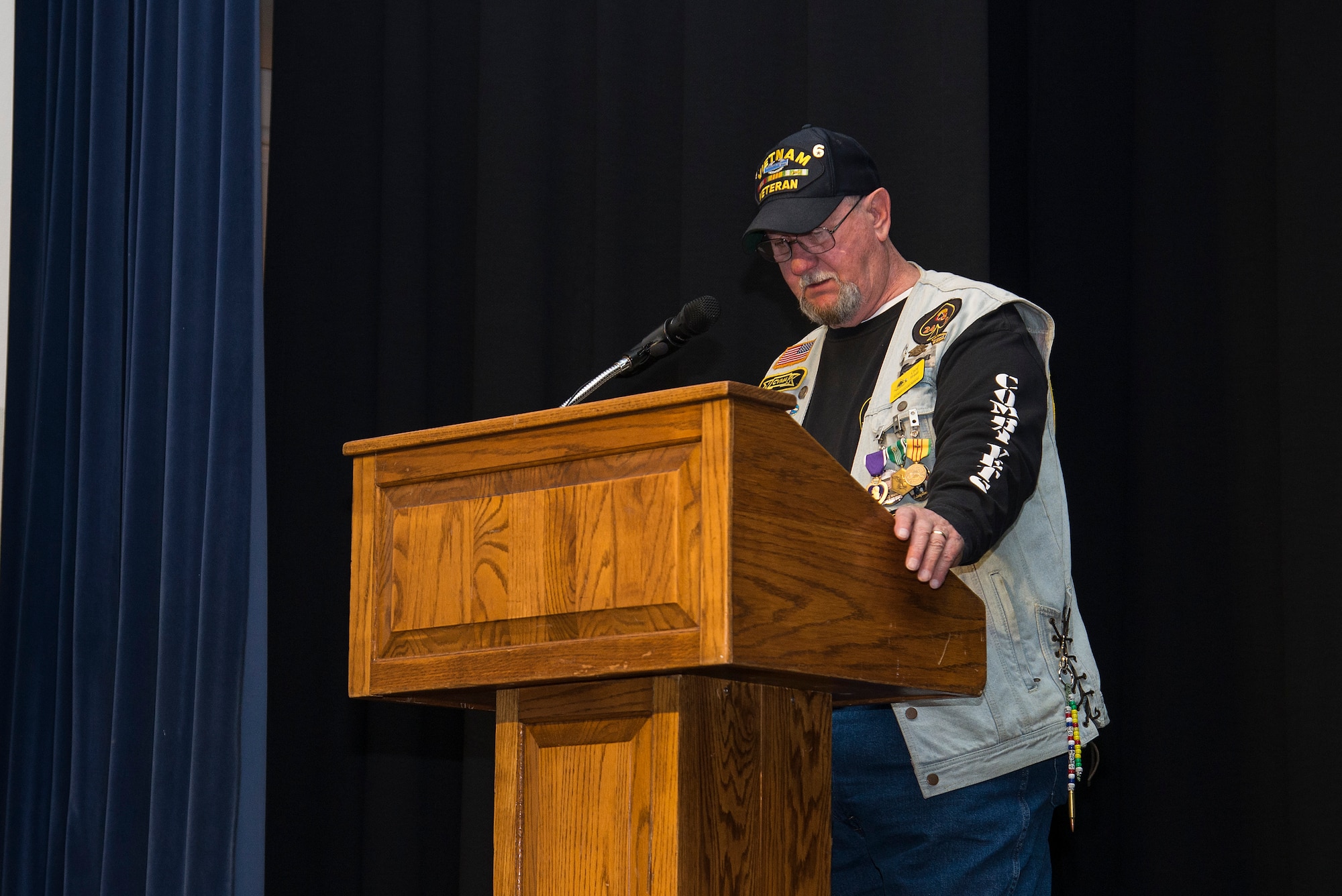 Retired Army SGT. Cecil Wade gives a short speech after receiving three Medals for his brave acts in Vietnam April 22, 2016 at Scott Air Force Base, Illinois. During his speech Wade said, Today has been quite a day ... I'm the lucky one. So many did not come home. (Air Force photo by Airman 1st Class Gwendalyn Smith)