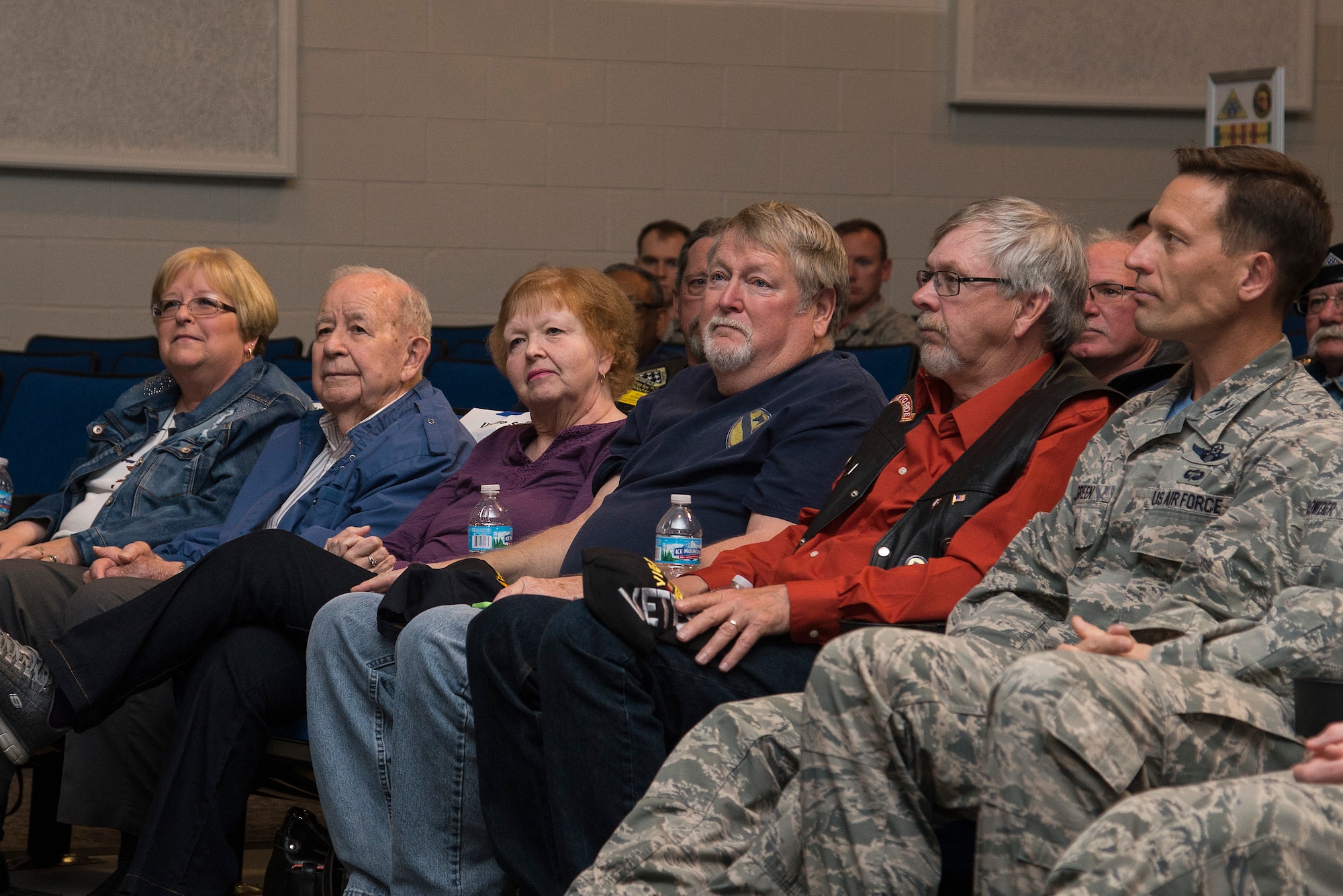 Retired Army SGT. Cecil Wade’s family wait to see Wade presented with his medals flag April 22, 2016 at Scott Air Force Base, Illinois. Wade was originally presented the Army Commendation Medal and Vietnam Service Medal when he returned from Vietnam. Since then the Department of the Army made the decision to add Valor to his Commendation Medal and another bronze star to his Vietnam Medal. (Air Force photo by Airman 1st Class Gwendalyn Smith)
