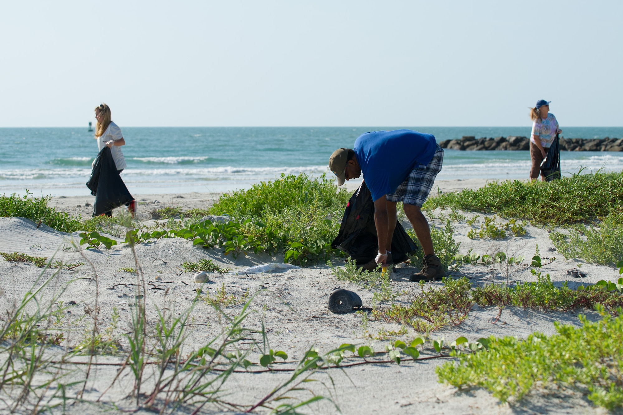More than 60 volunteers gathered debris during the annual Spring Beach Cleanup at Cape Canaveral Air Force Station, Fla., beaches April 28, 2016. Airmen, civilians and family members spent four hours and removed approximately 5 tons of trash from the beach. The cleanup was organized by the 45th Civil Engineer Squadron environmental conservation team as part of the 45th Space Wing’s commitment to environmental stewardship. (U.S. Air Force photos/Benjamin Thacker) (Released)