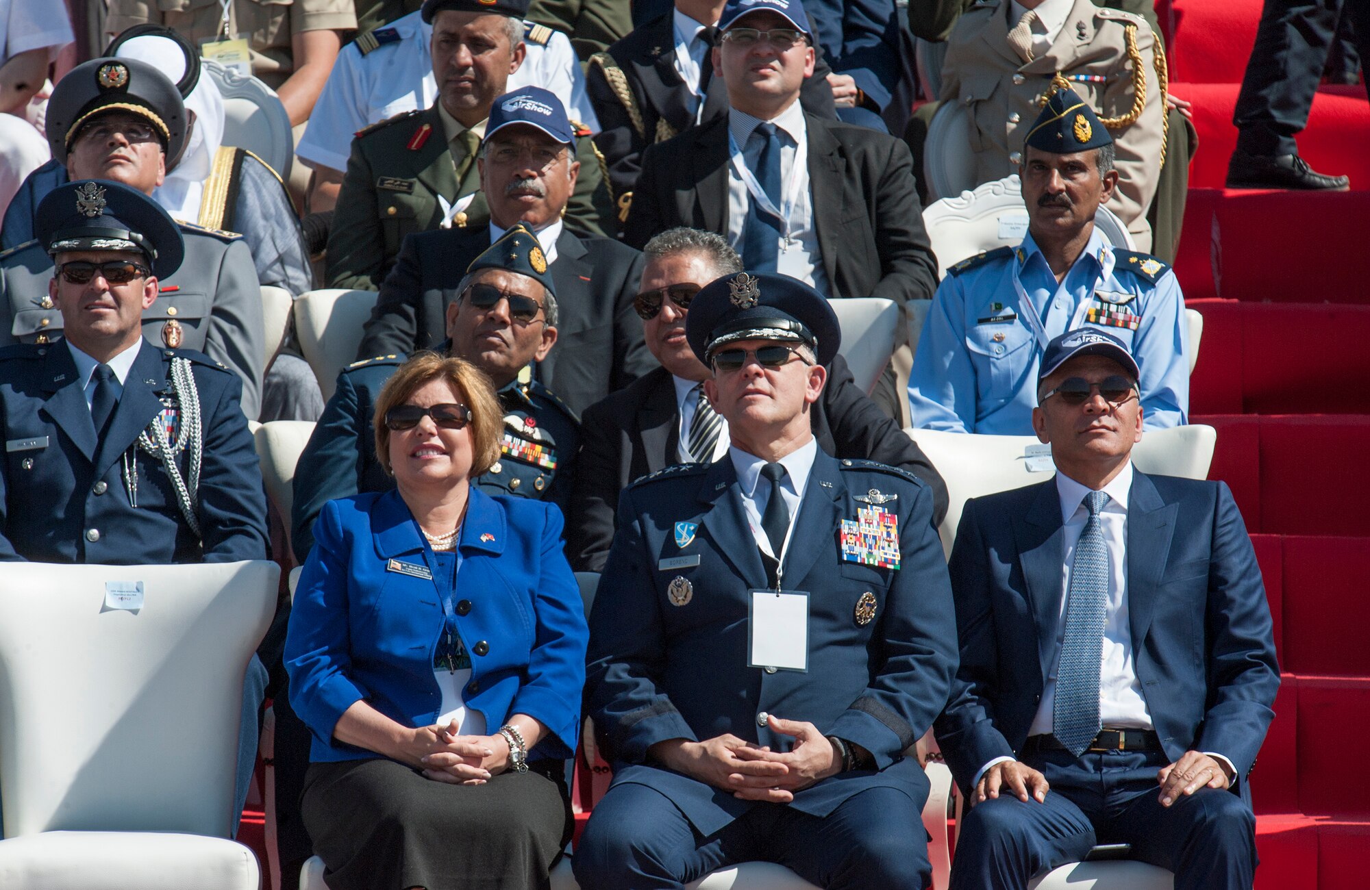 Mrs. Heidi Grant (center left), the Deputy Under Secretary of the Air Force of International Affairs, and U.S. Air Force General Frank Gorenc (center right), Commander of U.S. Air Forces in Europe – Air Forces Africa, watch an aircraft fly over during the opening day ceremony of the International Marrakech Airshow in Morocco on Apr. 27, 2016. Several U.S. independent and government owned aircraft were displayed at the expo in an effort to demonstrate their capabilities to a broad audience of individuals from approximately 54 other countries. (DoD News photo by TSgt Brian Kimball)