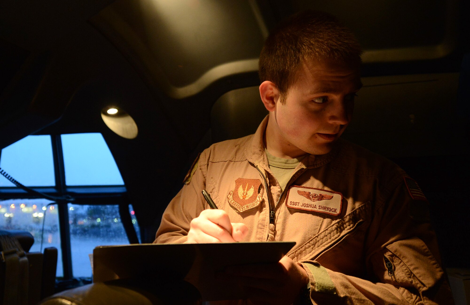 U.S. Staff Sergeant Joshua Shryock, a loadmaster with the 37th Airlift Squadron (AS), completes his pre-flight checks for a C-130J Hercules prior to take off from Ramstein Air Base, Germany on Apr. 26, 2016. SSgt Shryock is part of a six-man flight crew entrusted with transporting the aircraft to the 2016 International Marrakech Airshow in Morocco. (DoD News photo by TSgt Brian Kimball)