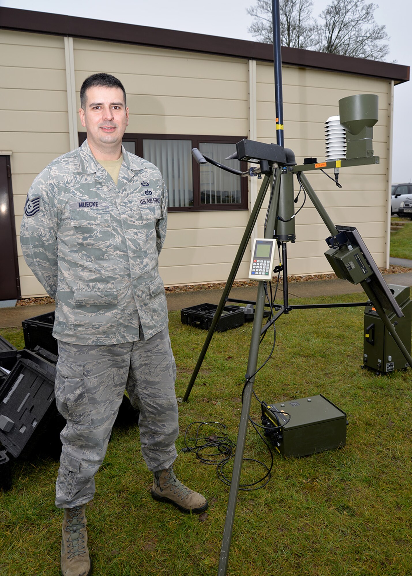 U.S. Air Force Tech. Sgt. Alvin Muecke, 352nd Special Operations Support Squadron NCO in charge, poses for a photograph by tactical meteorological observing system equipment March 10, 2016, on RAF Mildenhall, England. The TMOS is used to sense the atmosphere and provides hourly observations to weather personnel. Muecke recently spent 10 days in Norway as part of the Norwegian Partnership Development Program working with special operations forces from both the U.S. Air Force and Norwegian air force. (U.S. Air Force photo by Karen Abeyasekere/Released)