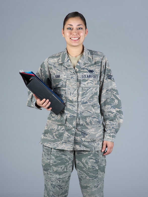 Senior Airman Cinnamon Kava, 60th Logistics Readiness Squadron decentralized supply support, poses for a photo in December 2014 at Travis Air Force Base, Calif. 