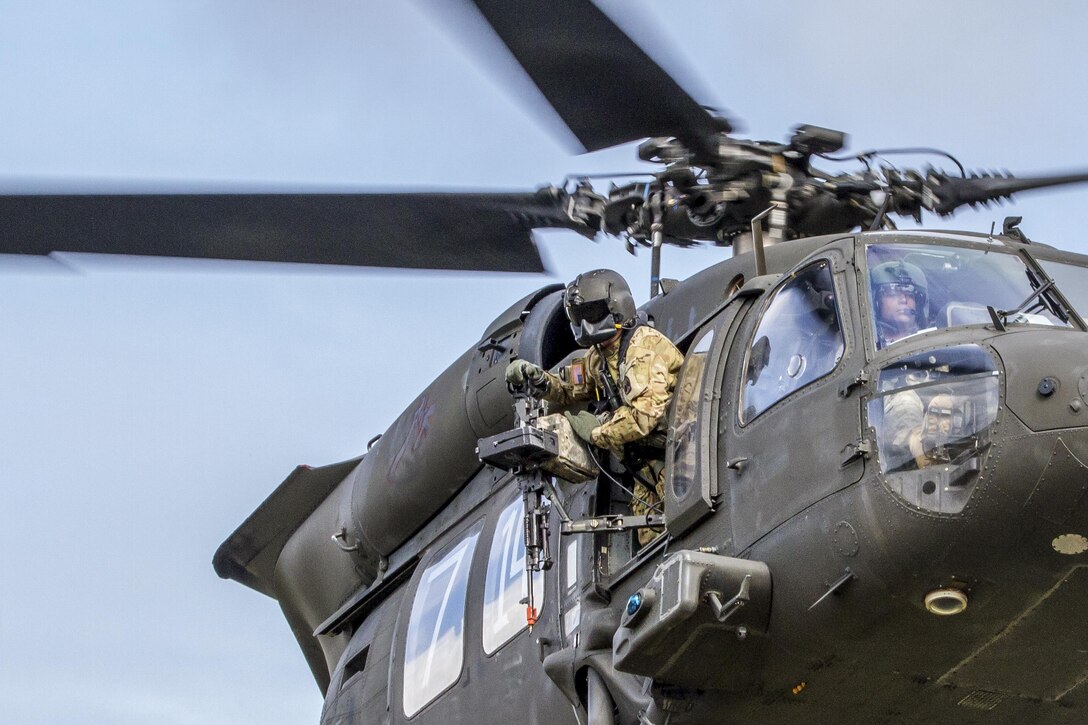 An Army UH-60 Black Hawk helicopter supports air assault training with soldiers at Joint Base Lewis-McChord, Wash., April 27, 2016. The battalion-sized air assault allowed the infantry soldiers to train for future missions. The soldiers are assigned to the 4th Battalion, 23rd Infantry Regiment, 2nd Stryker Brigade Combat Team. Army photo by Capt. Brian Harris