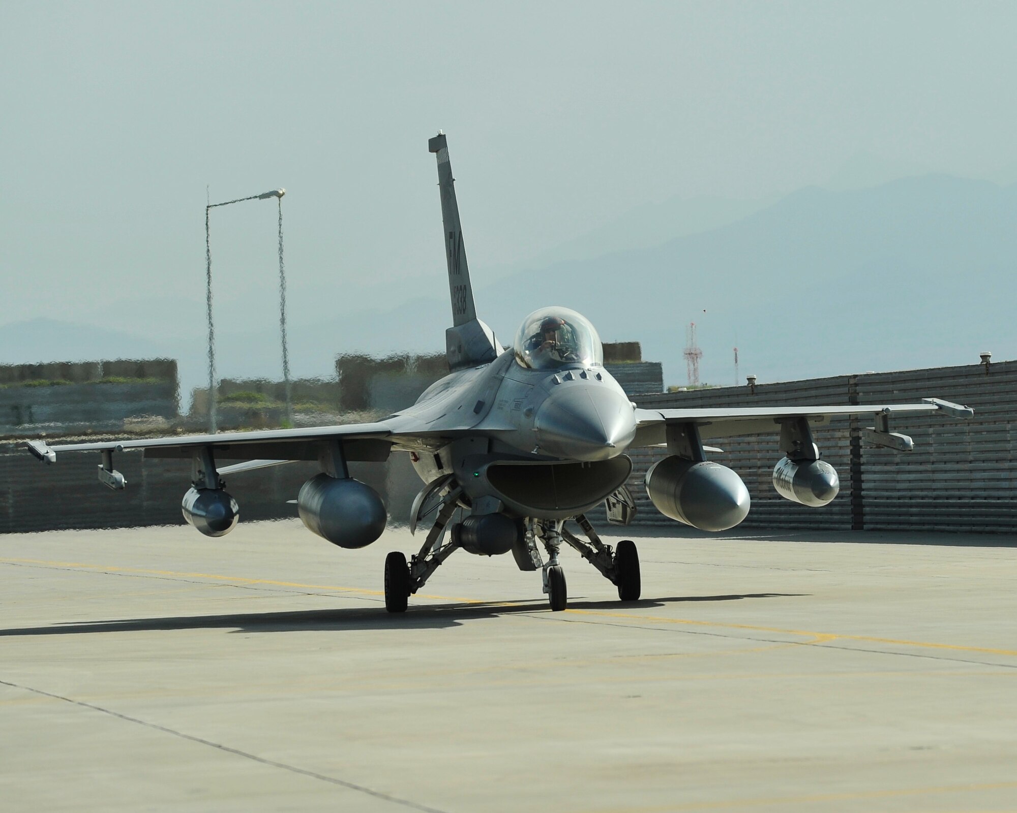 An F-16 assigned to the 457th Expeditionary Fighter Squadron arrives at Bagram Airfield, Afghanistan, 27 April, 2016. The 457th EFS, based out of Bagram Airfield, Afghanistan, is the only dedicated fighter squadron in the country and continuously supports Operation Freedom’s Sentinel and the NATO Resolute Support mission. (U.S Air Force photo by Capt. Korey Fratini/released)