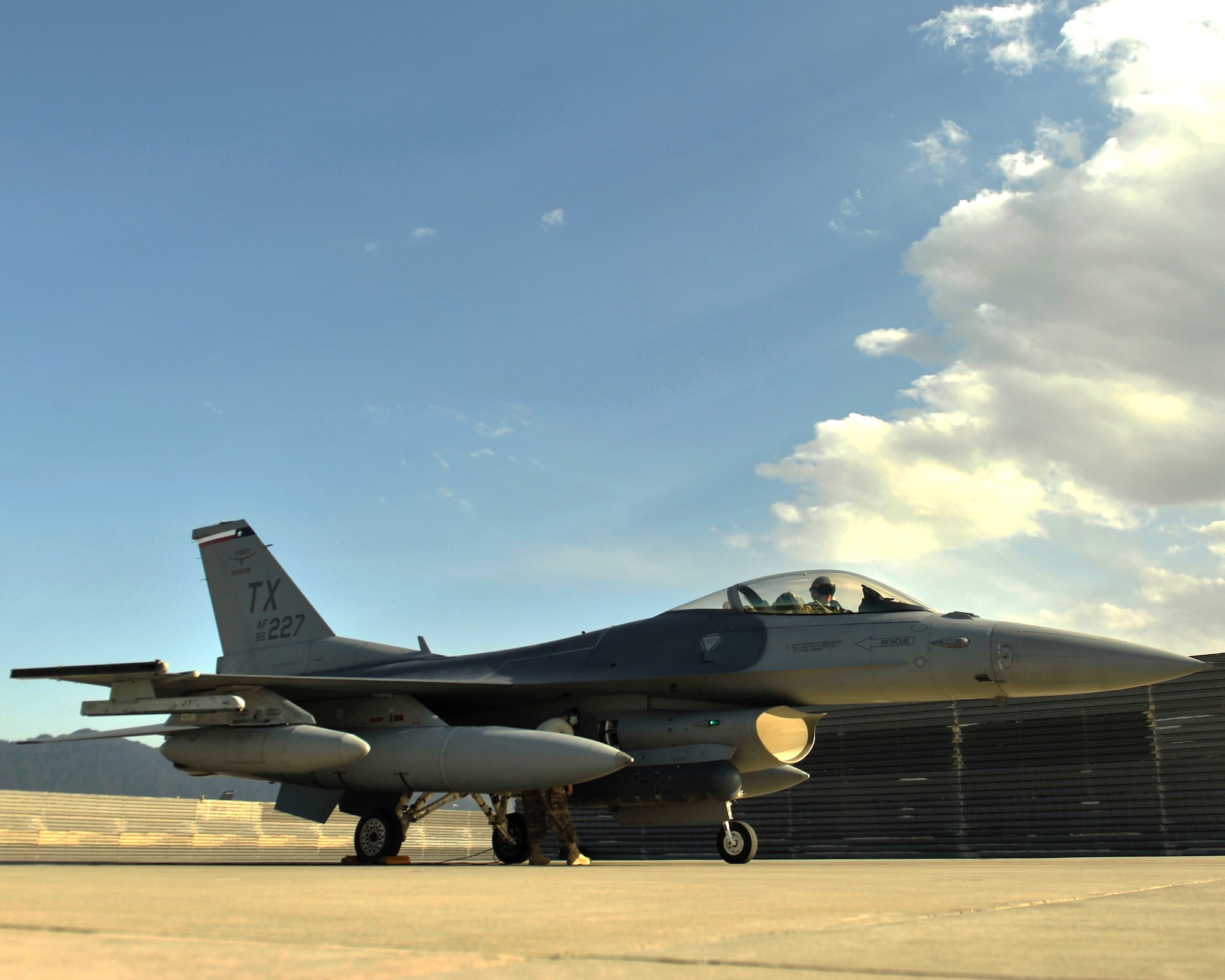 An F-16 Fighting Falcon from the 457th Expeditionary Fighter Squadron arrives at Bagram Airfield, Afghanistan, 27 April, 2016. The 457th EFS is responsible for providing close air support throughout Afghanistan in support of Operation Freedom's Sentinel. (U.S. Air Force photo by Capt. Korey Fratini/released)