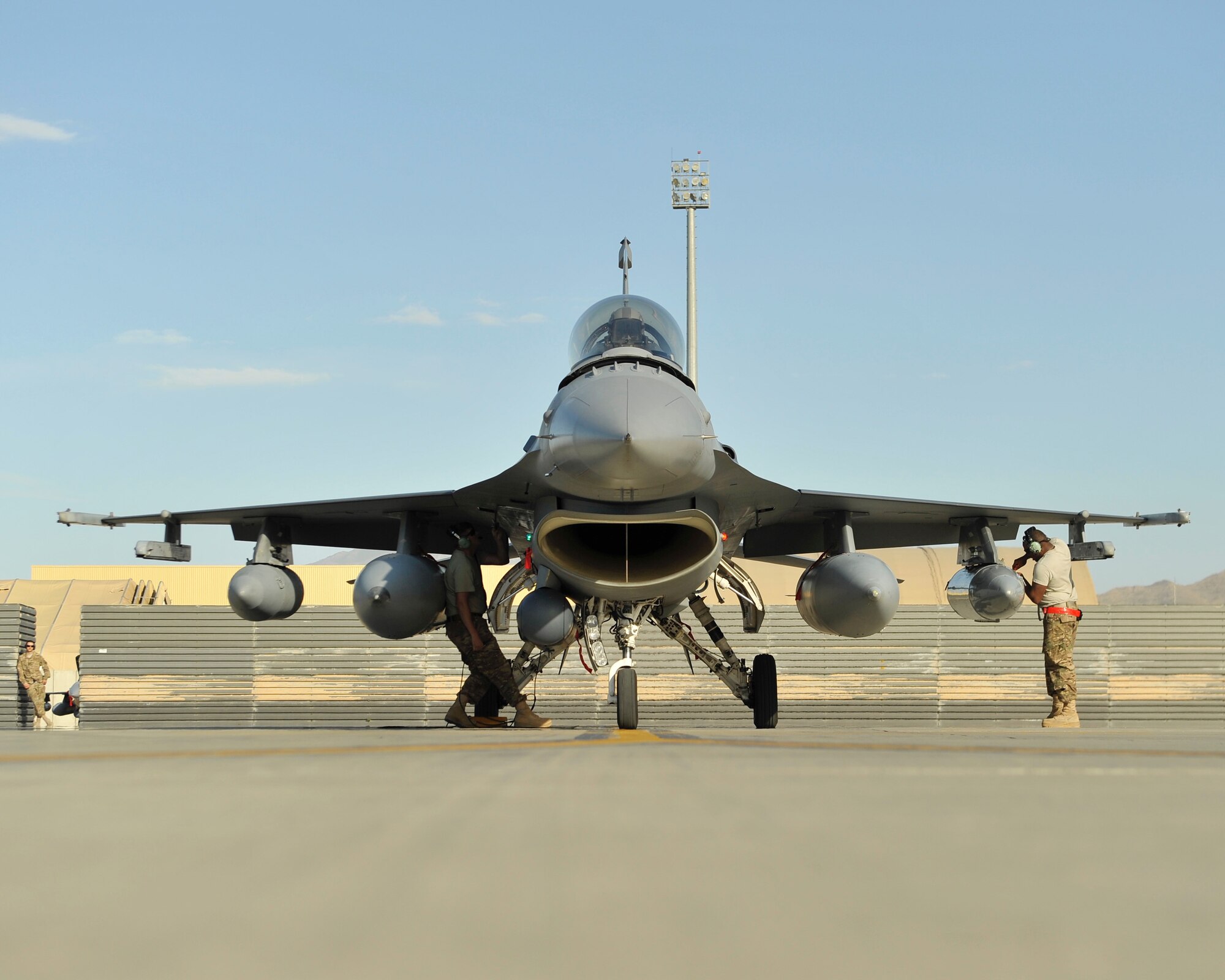 Maintainers from the 455th Expeditionary Aircraft Maintenance Unit inspect an F-16 Fighting Falcon from the 457th Expeditionary Fighter Squadron after arriving to Bagram Airfield, Afghanistan, 27 April, 2016. The 457th EFS is deployed to Afghanistan to support Operation Freedom’s Sentinel as the only dedicated fighter squadron in Afghanistan. (U.S. Air Force photo by Capt. Korey Fratini/released)