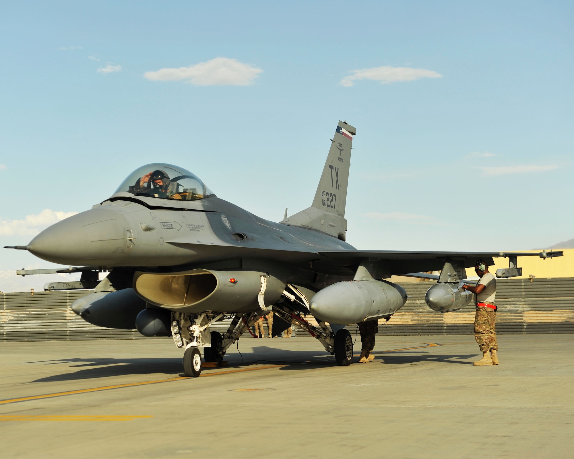Maintainers from the 455th Expeditionary Aircraft Maintenance Unit inspect an F-16 Fighting Falcon from the 457th Expeditionary Fighter Squadron after arriving to Bagram Airfield, Afghanistan, 27 April, 2016. The 457th EFS is deployed to Afghanistan to support Operation Freedom’s Sentinel as the only dedicated fighter squadron in Afghanistan. (U.S. Air Force photo by Capt. Korey Fratini/released)