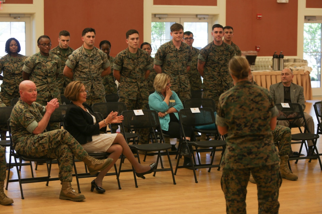 Lieutenant Col. Lauren Edwards, the commanding officer of 8th Engineer Support Battalion, recognizes Marines in her unit for all of the hours they put in to volunteering during a ceremony held at Camp Lejeune, N. C., April 27, 2016. After thanking the battalion volunteers as a whole, Edwards asked individuals to stand so she could share their accomplishments in volunteering with the rest of the service members in attendance. (U.S. Marine Corps photo by Cpl. Melodie Snarr/Released)
