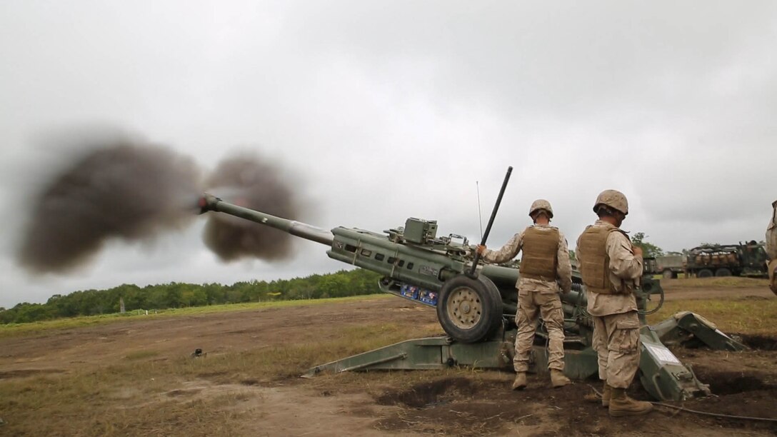 Marines fire a high-explosive round from an M777A2 lightweight 155 mm howitzer during live-fire artillery training Sept. 2 at the Yausubetsu Maneuver Area in Hokkaido as part of Artillery Relocation Training Program 14-2.  The Yausubetsu Maneuver Area is the largest training area available to U.S. Marines in the ARTP and affords the opportunity to fire at greater distances than other training areas. The Marines are with Battery B, 1st Battalion, 12th Marine Regiment, currently assigned to 3rd Battalion, 12th Marines, 3rd Marine Division, III Marine Expeditionary Force. 