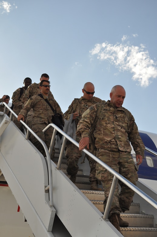 Soldiers assigned to the 716th Engineer Company, deplane after arriving at the Silas. L. Copeland Arrival/Departure Airfield Control group April 18.