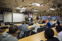 Col. Scott Durham, 512th Airlift Wing commander, speaks to  JROTC cadets at Caesar Rodney High School, April 29, at Camden, Del., about how the Air Force Reserve works and integrates into Active Duty. Durham, along with 512th Airlift Wing recruiter Senior Master Sgt. Joann Shaw, offered advice of wisdom to the students on the importance of having a plan. (U.S. Air Force photo/Capt. Bernie Kale)