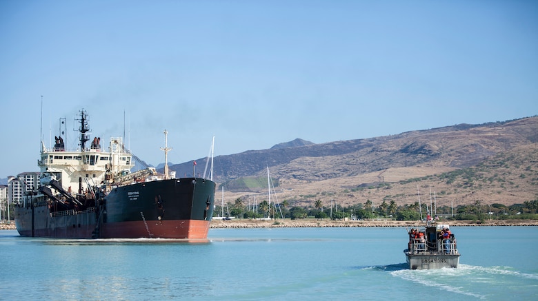 The U.S. Army Corps of Engineers’ hopper dredge Essayons just finished vital maintenance dredging of the federal navigation channels in Honolulu, Barbers Point (shown here), Kahului, Hilo, and Nawiliwili commercial harbors.  Hawaii is a maritime state over 2,400 miles from the mainland and far more dependent on its harbors than most of the United States. The Hawaii state DOT claims that over 80 percent of all consumer goods – food, clothing, autos, building supplies, machinery, paper, and allied products, medical supplies, and agricultural materials – are imported into the state. Of that 80 percent, approximately 98 percent enters Hawaii though commercial harbors on the major islands.  To ensure that these vital goods continue to arrive in Hawaii, the Essayons dredged approximately 300,000 cubic yards from the harbors and safely disposed of it at EPA-designated ocean disposal sites.  Special care was taken to protect marine life such as sea turtles.