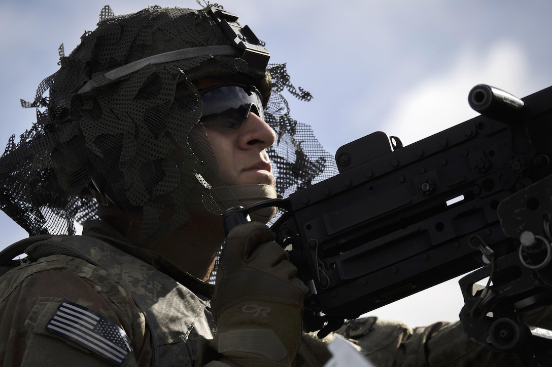 Army Spc. Daniel Saenz scans his sector of fire on an M2 .50-caliber machine gun range at Joint Base Elmendorf-Richardson, Alaska, April 26, 2016. Saenz is a paratrooper assigned to the 25th Infantry Division’s 40th Cavalry Regiment, 4th Brigade Combat Team (Airborne), Alaska. The machine gun, designed in 1918, has been in service since 1933. The United States and its allies manufacture the weapon, commonly referred to as the "Ma Deuce." Air Force photo by Justin Connaher