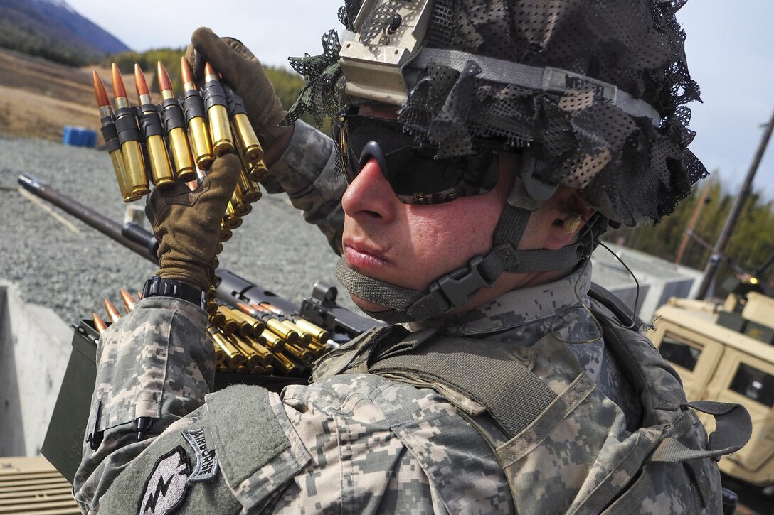 Army Spc. Dillon Weitzel waits for the order to fire on an M@ .50-caliber machine gun range at Joint Base Elmendorf-Richardson, Alaska, April 26, 2016. Weitzel is a paratrooper assigned to the 25th Infantry Division’s 40th Cavalry Regiment, 4th Brigade Combat Team (Airborne), Alaska. Air Force photo by Justin Connaher