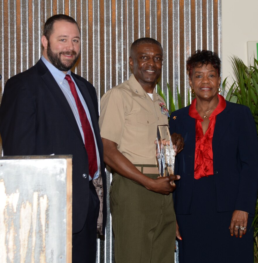 Col. James C. Carroll III, commanding officer, Marine Corps Logistics Base Albany, accepts the 2016 Only One Albany Industry Award from the Albany-Dougherty Economic Development Commission during a special Rise-n-Shine breakfast honoring local industries and hosted by the Albany Area Chamber of Commerce, recently.