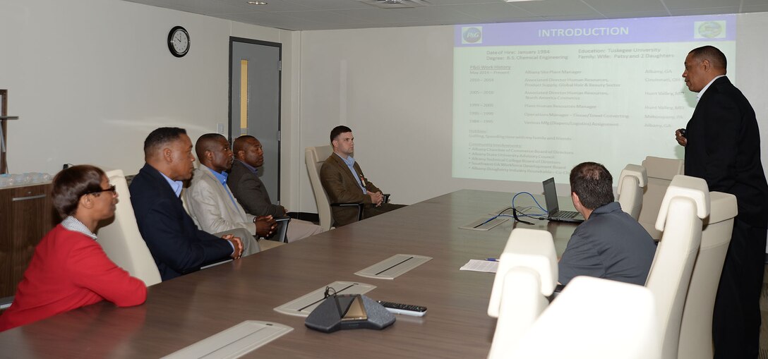 Maj. Gen. Craig Crenshaw, commanding general, Marine Corps Logistics Command and Col. James C. Carroll III, commanding officer, Marine Corps Logistics Base Albany, accompanied by their sergeants majors, receive a brief before their tour of Procter and Gamble in Albany, Ga., recently. Werhner Washington, plant manager, P&G, hosted the visit along with Levent Gokcen, a member of his management team.