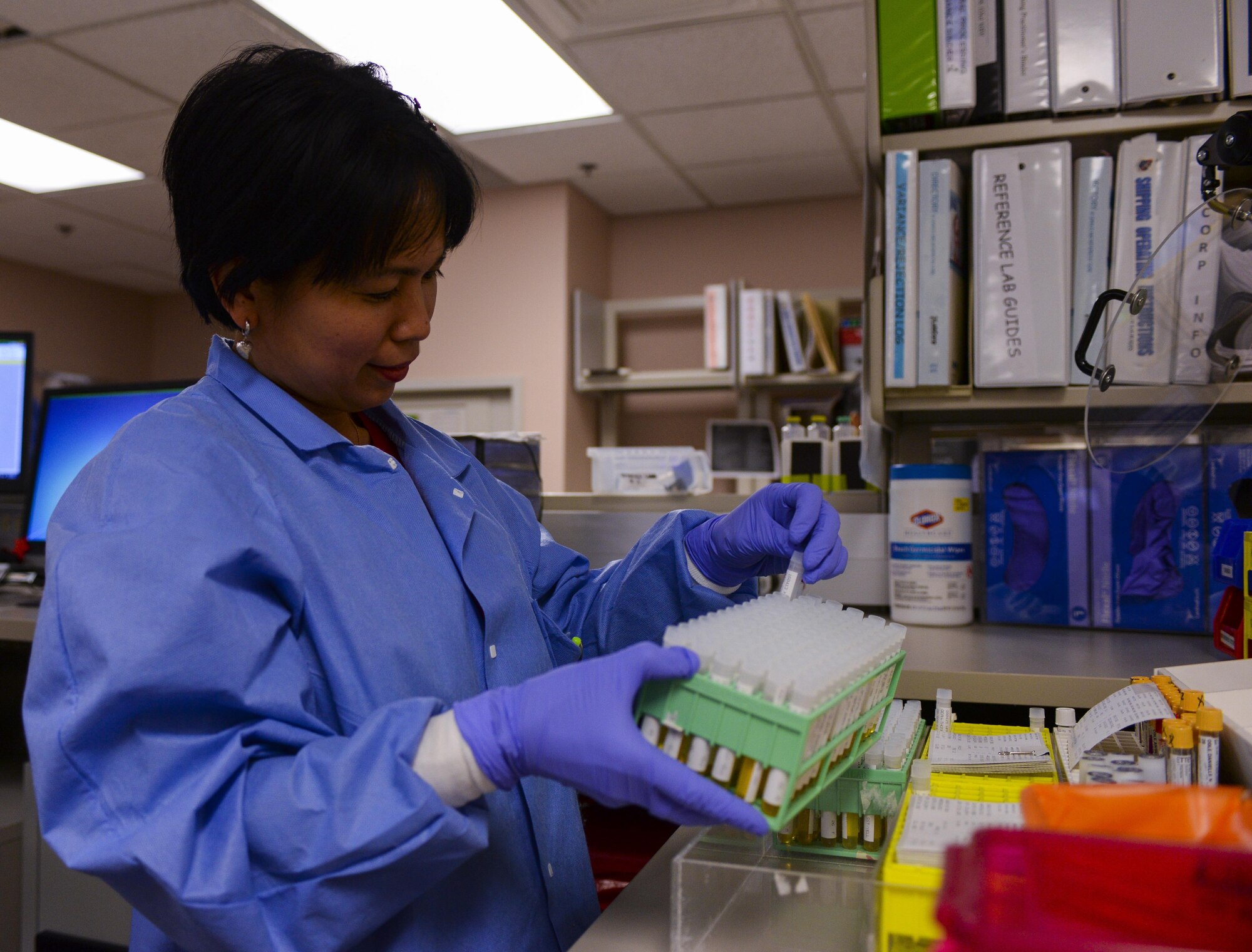 A lab technician, assigned to the 99th Medical Support Squadron, checks the samples at Nellis Air Force Base, Nev., April 15, 2016. Medical Laboratory Professionals Week kicked off for the men and women of the 99th MDSS Laboratory Pathology Flight on April 25.