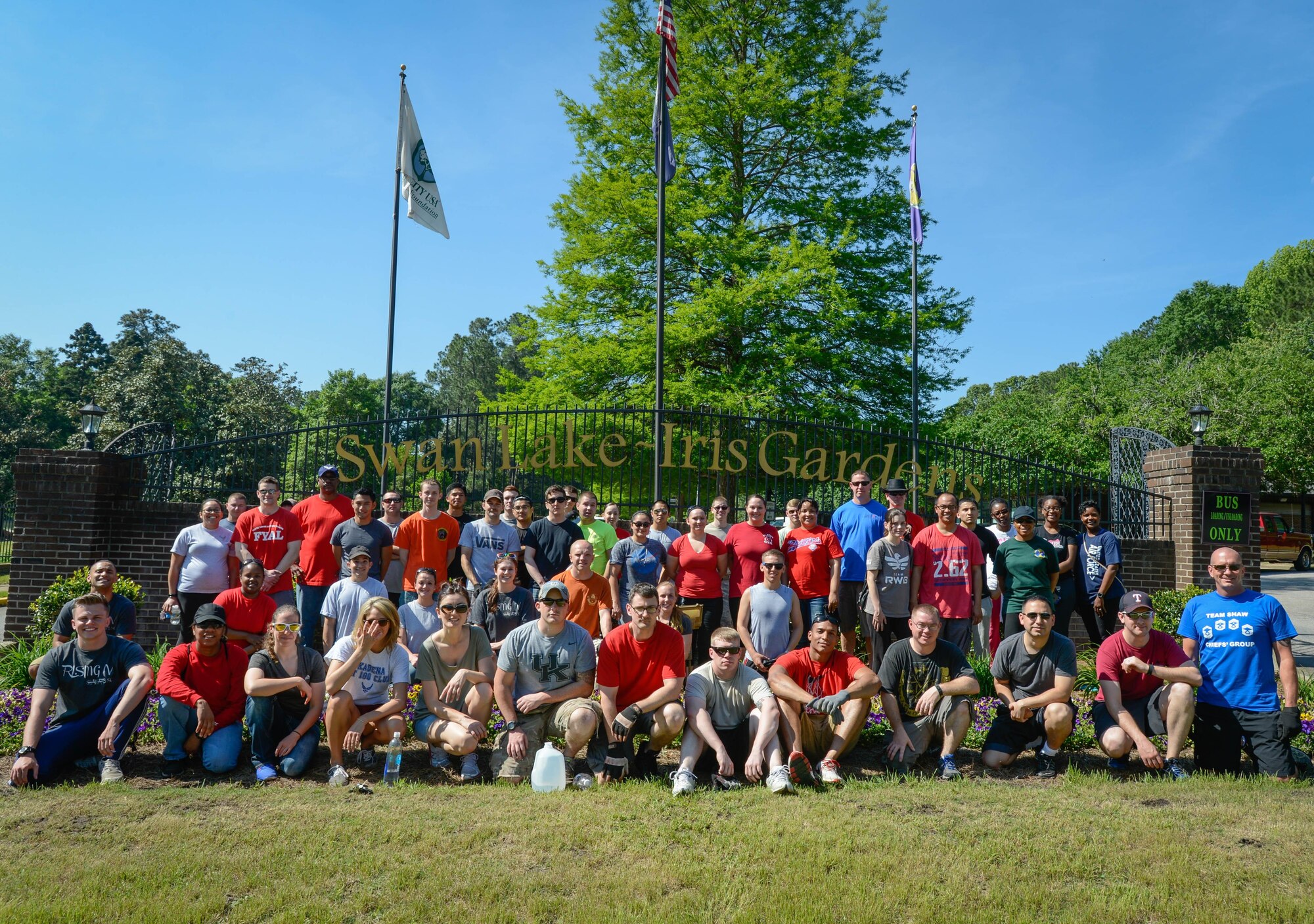 U.S. Airmen volunteer at Swan Lake and Iris Gardens in Sumter, S.C., April 29, 2016. Led by Team Shaw 5/6, a professional organization, approximately 50 Airmen spent their day beautifying Swan Lake and Sumter parks. The Team Shaw synergy volunteer program plans to continue their efforts quarterly in order to build a strong relationship with the community and improve the quality of life for all residents. (U.S. Air Force photo by Senior Airman Jensen Stidham)